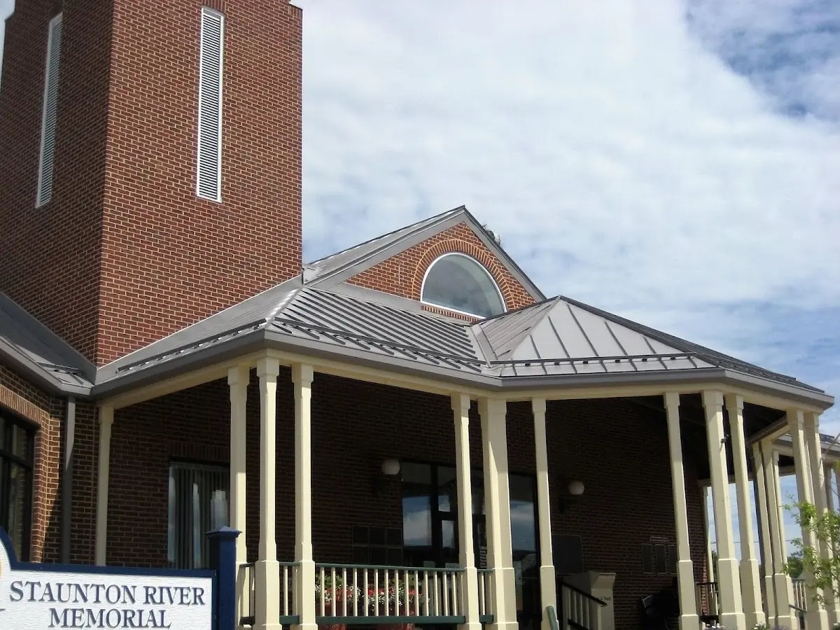 Skilled roofing craftsmen working on a residential roof in Maryland Heights